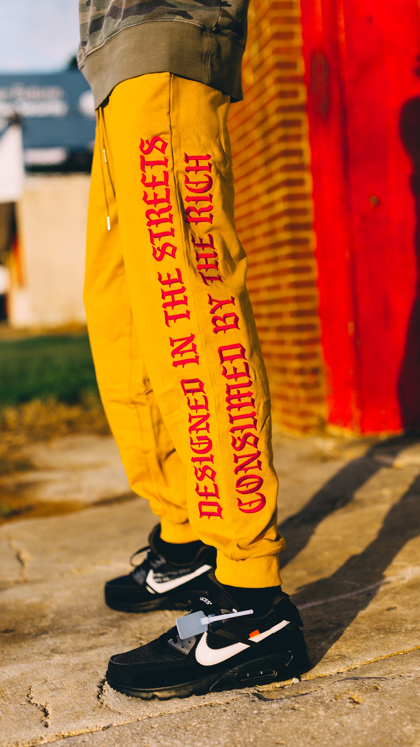 CONSUMED BY THE RICH JOGGERS (MUSTARD)